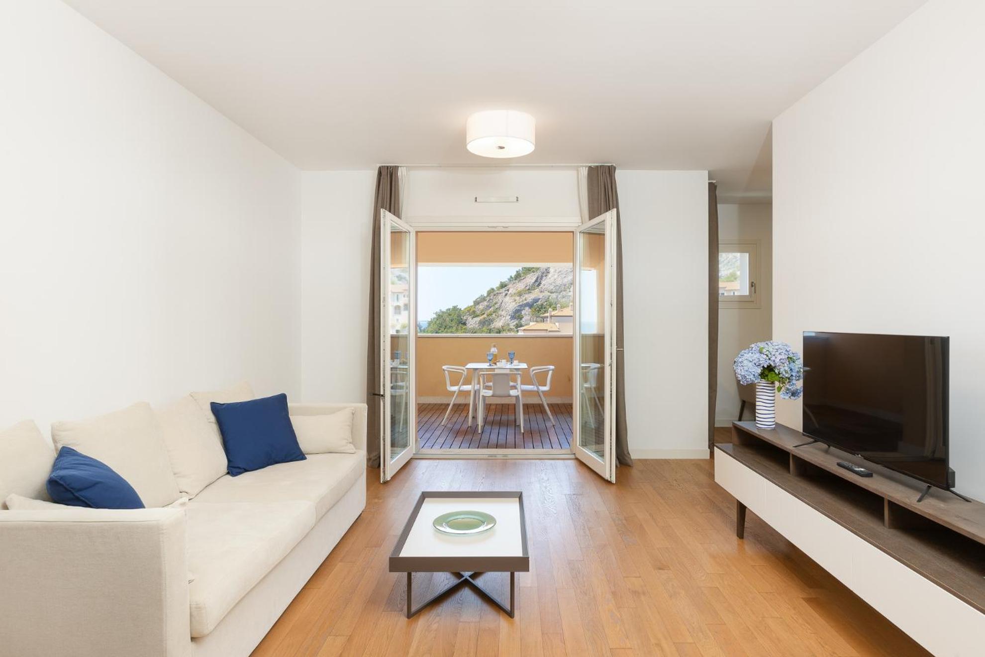Portopiccolo Apartments ซิสเตียนา ภายนอก รูปภาพ